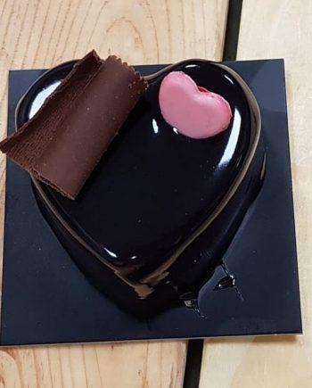 Postre individual de chocolate 70% y frambuesa